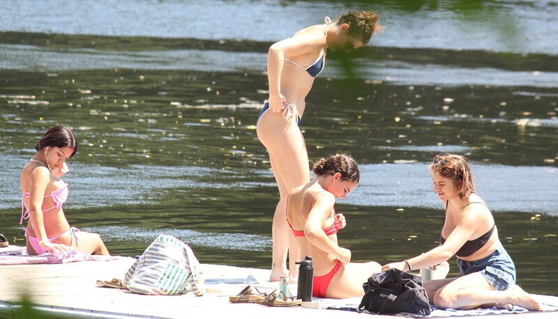 group of 3 bikini college sunbathers